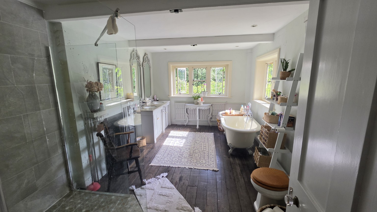 Main bathroom with freestanding bath, shower and double vanity